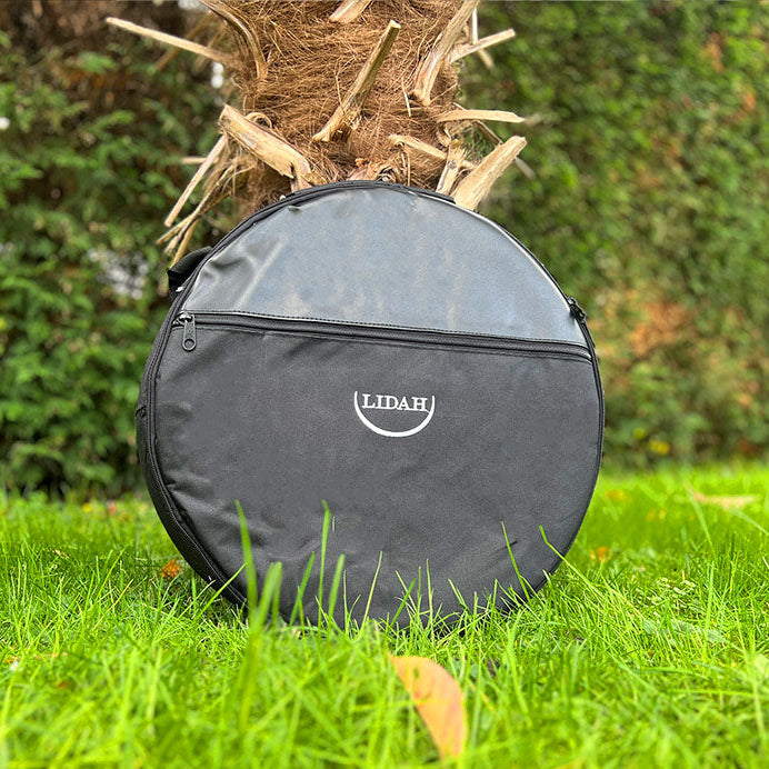 LIDAH Shamanic Drum Bag sitting agains a tree outside