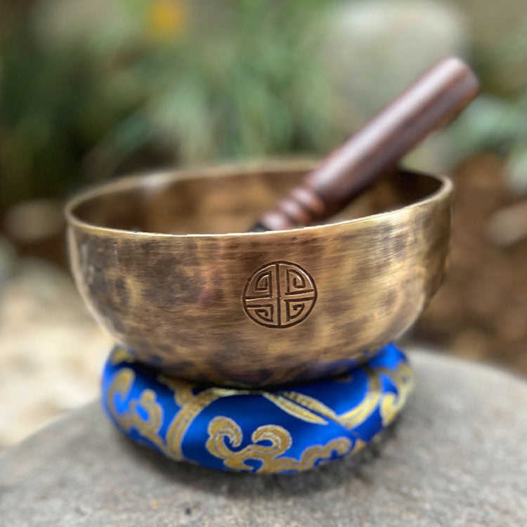 Full Moon LIDAH Singing Bowl placed on cushion in serene room