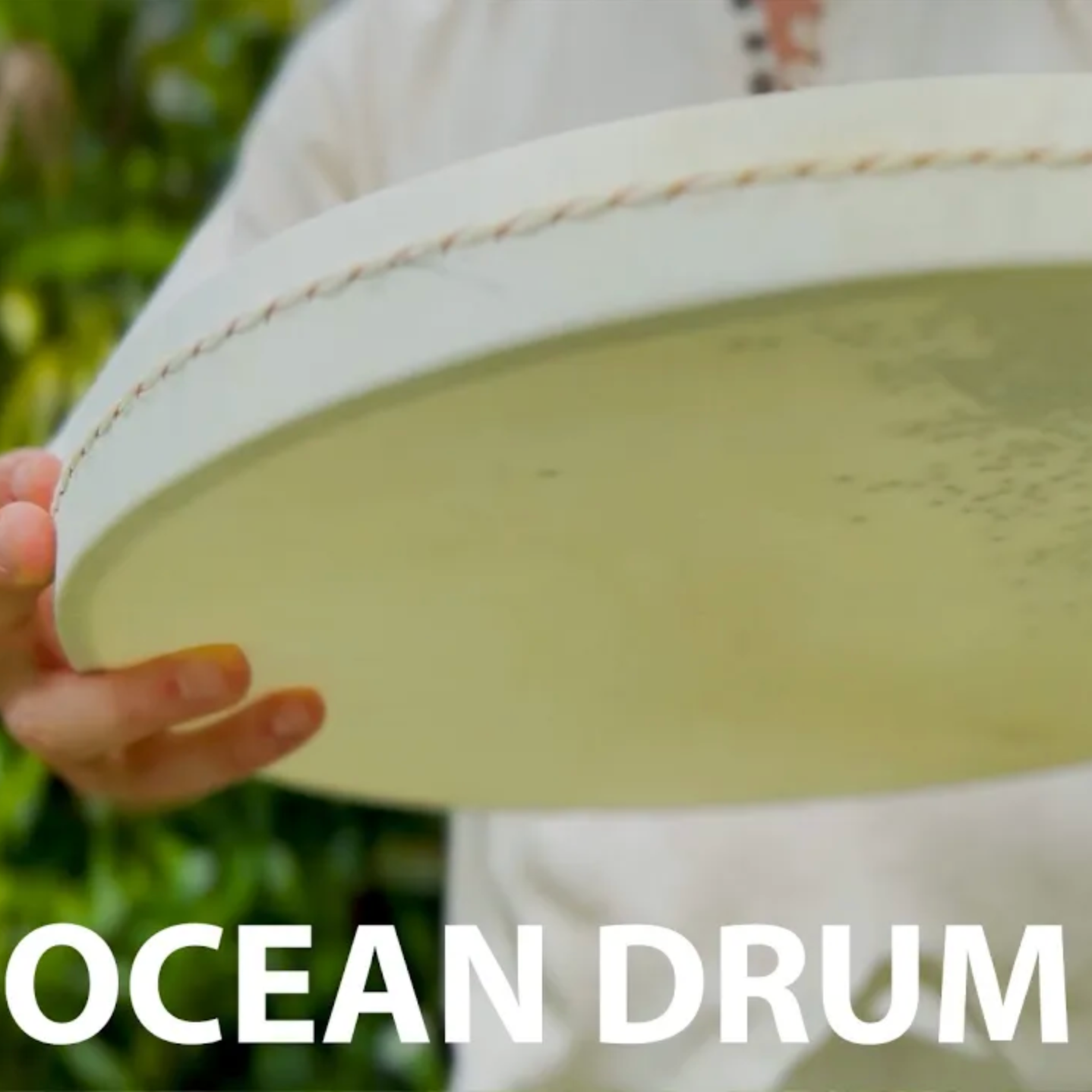 Sound healer using LIDAH® Ocean Drum for therapy session