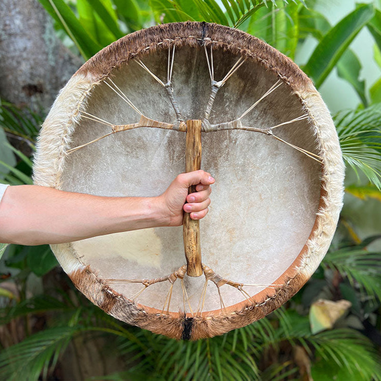 Musician performing ancient rhythm with LIDAH® Shamanic Drum
